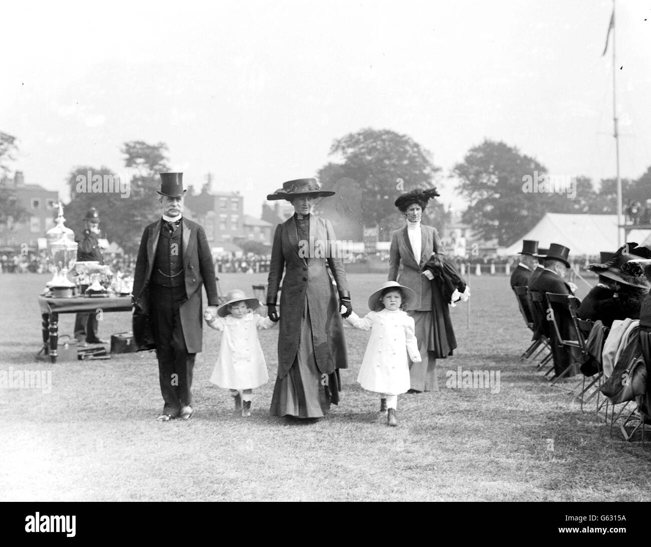Earl Carington and Lady Lewisham. Earl Carington, Lady Lewisham and her children at the Richmond Horse Show Stock Photo