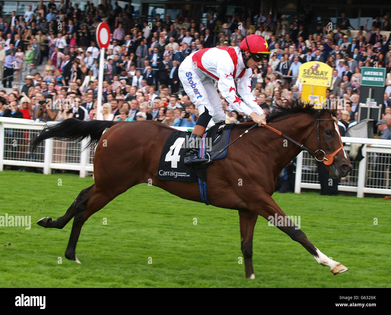 Toronado ridden by Richard Hughes wins the Carraig Insurance Winkfield stakes on day two of the Betfair Weekend at Ascot Racecourse, Ascot. Stock Photo