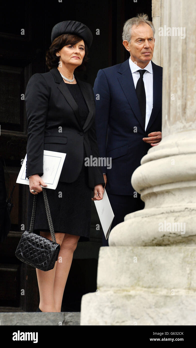 Former Prime Minister Tony Blair and his wife Cherie Blair leave after