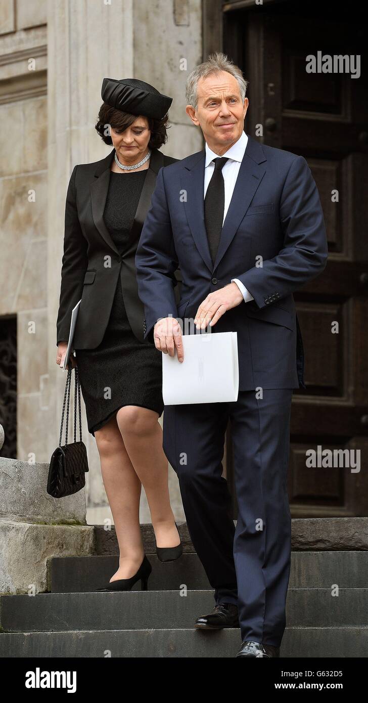 Former Prime Minister Tony Blair and his wife Cherie Blair leave after the funeral service of Baroness Thatcher, at St Paul's Cathedral, central London. Stock Photo