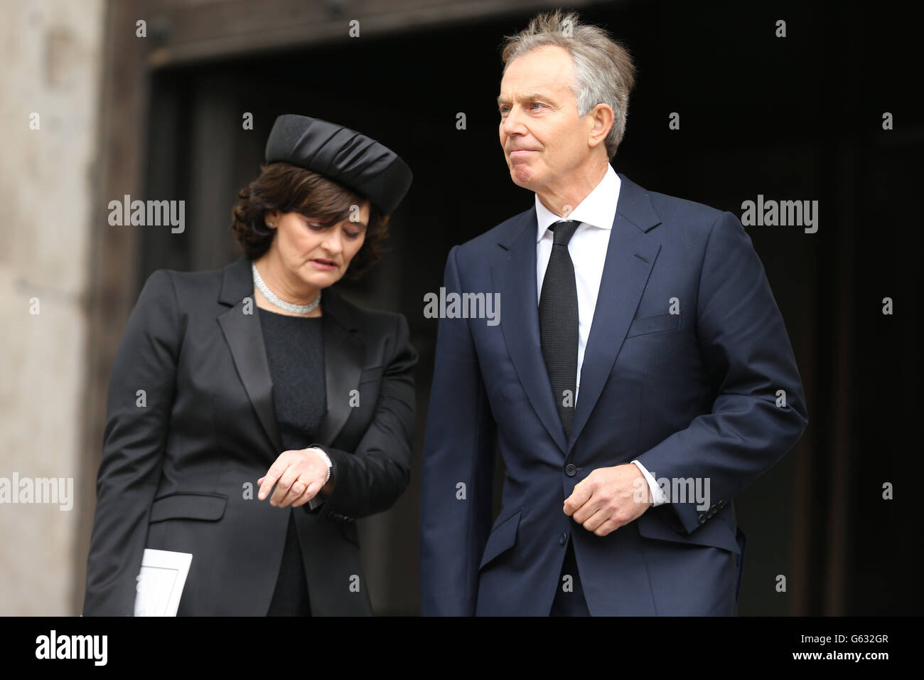 Former Prime Minister Tony Blair and his wife Cherie Blair leave the Ceremonial funeral of former British Prime Minister Baroness Thatcher at St Paul's Cathedral. Stock Photo