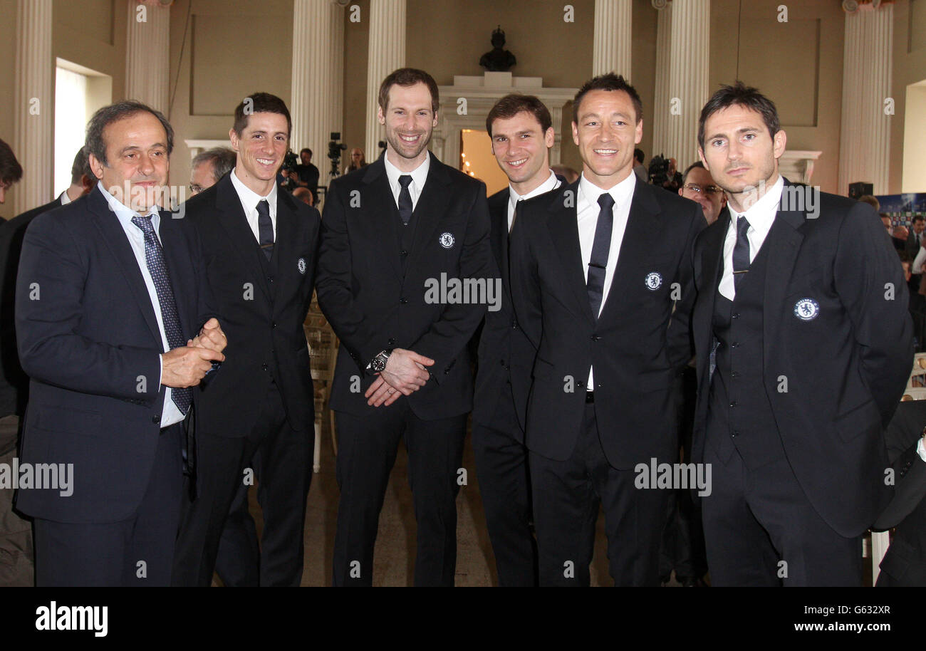 UEFA President Michel Platini (left) with Chelsea players (left to right) Fernando Torres, Petr Cech, Branislav Ivanovic, John Terry and Frank Lampard during the UEFA Champions League Trophy Handover at Banqueting House, London. Stock Photo