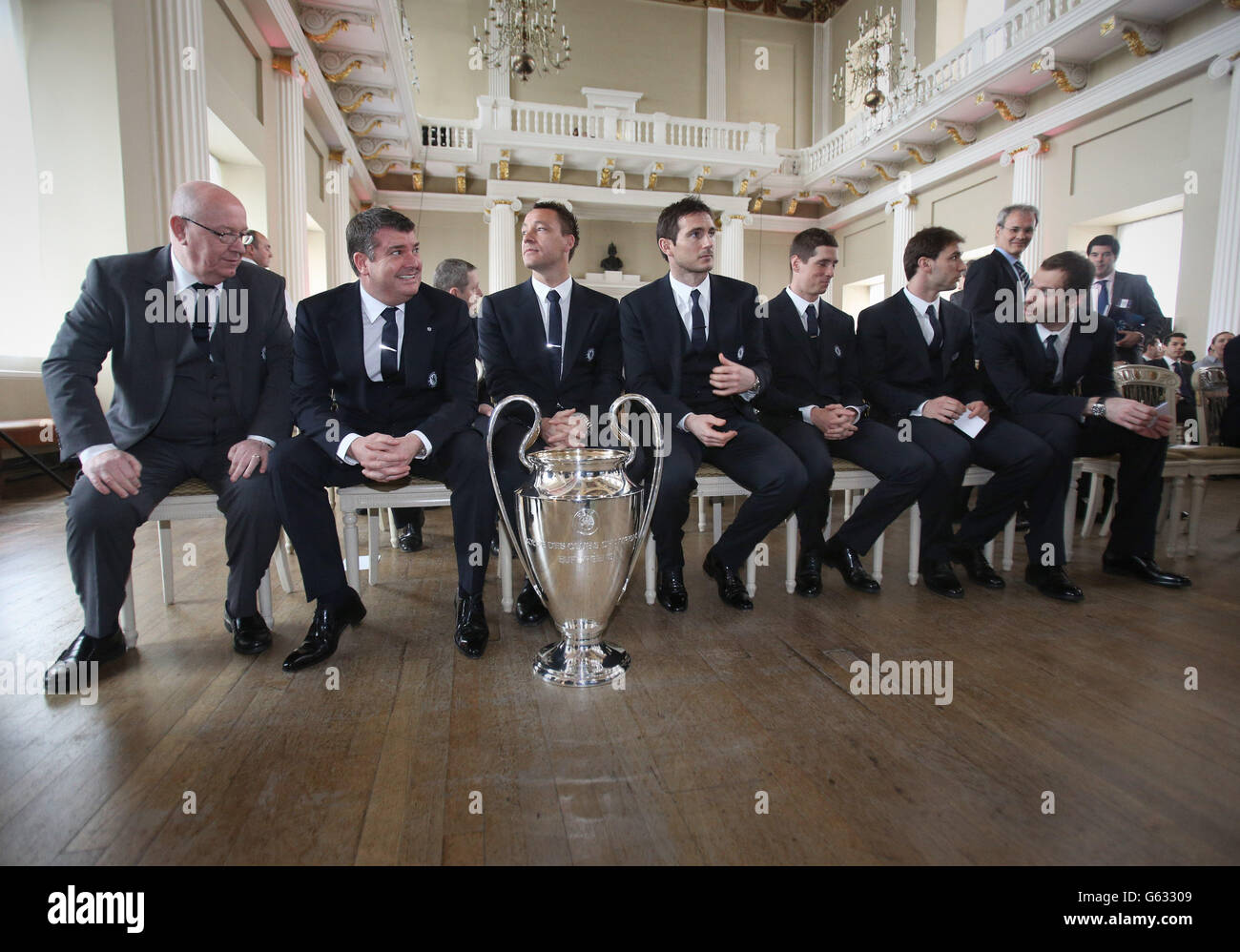 (left to right) Chelsea Club Secretary David Barnard, Chief Executive Ron Gourlay, John Terry, Frank Lampard, Fernando Torres, Branislav Ivanovic and Petr Cech during the UEFA Champions League Trophy Handover at Banqueting House, London. Stock Photo
