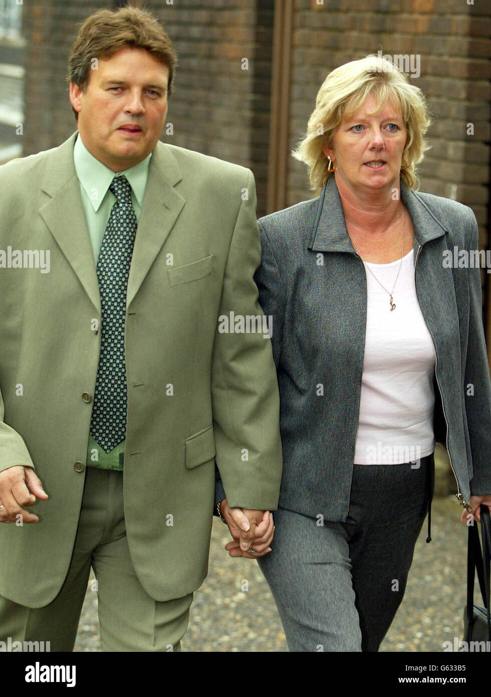 The parents of missing schoolgirl Danielle Jones, Tony and Linda Jones, arrive at Chelmsford Crown Court, Essex, the start of the trial of Danielle's uncle, Stuart Campbell, 44, who is accused of her abduction and murder. * Danielle disappeared on June 18, 2001 shortly after leaving her home in East Tilbury, Essex to catch a bus to school. Her body has never been discovered. 10/10/02 Linda Jones told a jury that her daughter was mature and sensible and afraid of the dark .Danielle's uncle, Stuart Campbell, 44, a builder of Grays, Essex, denies abducting and murdering her. Stock Photo