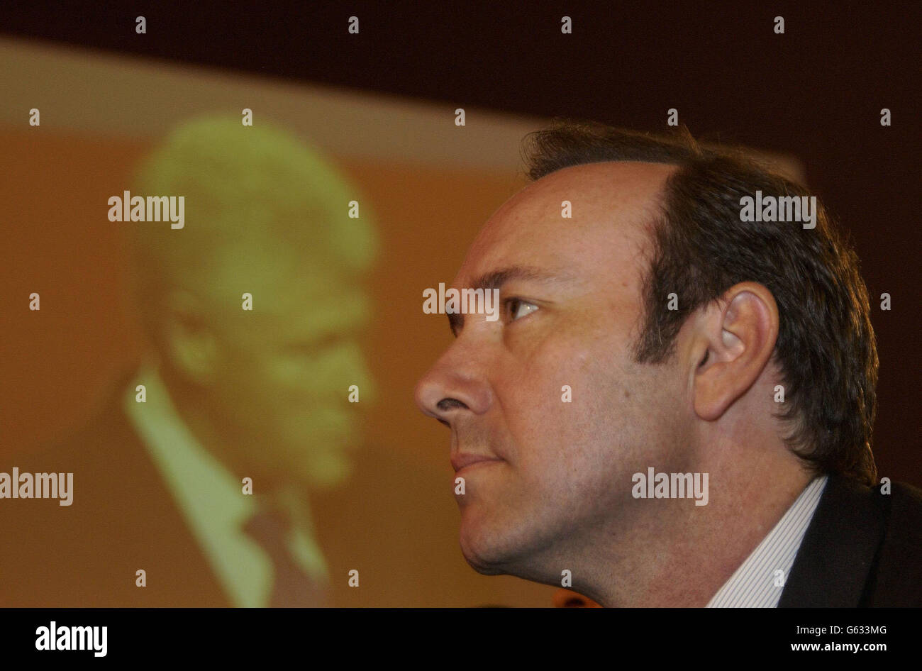 Actor Kevin Spacey watches as former US President Bill Clinton addresses the Labour Party Conference, in Blackpool. Stock Photo