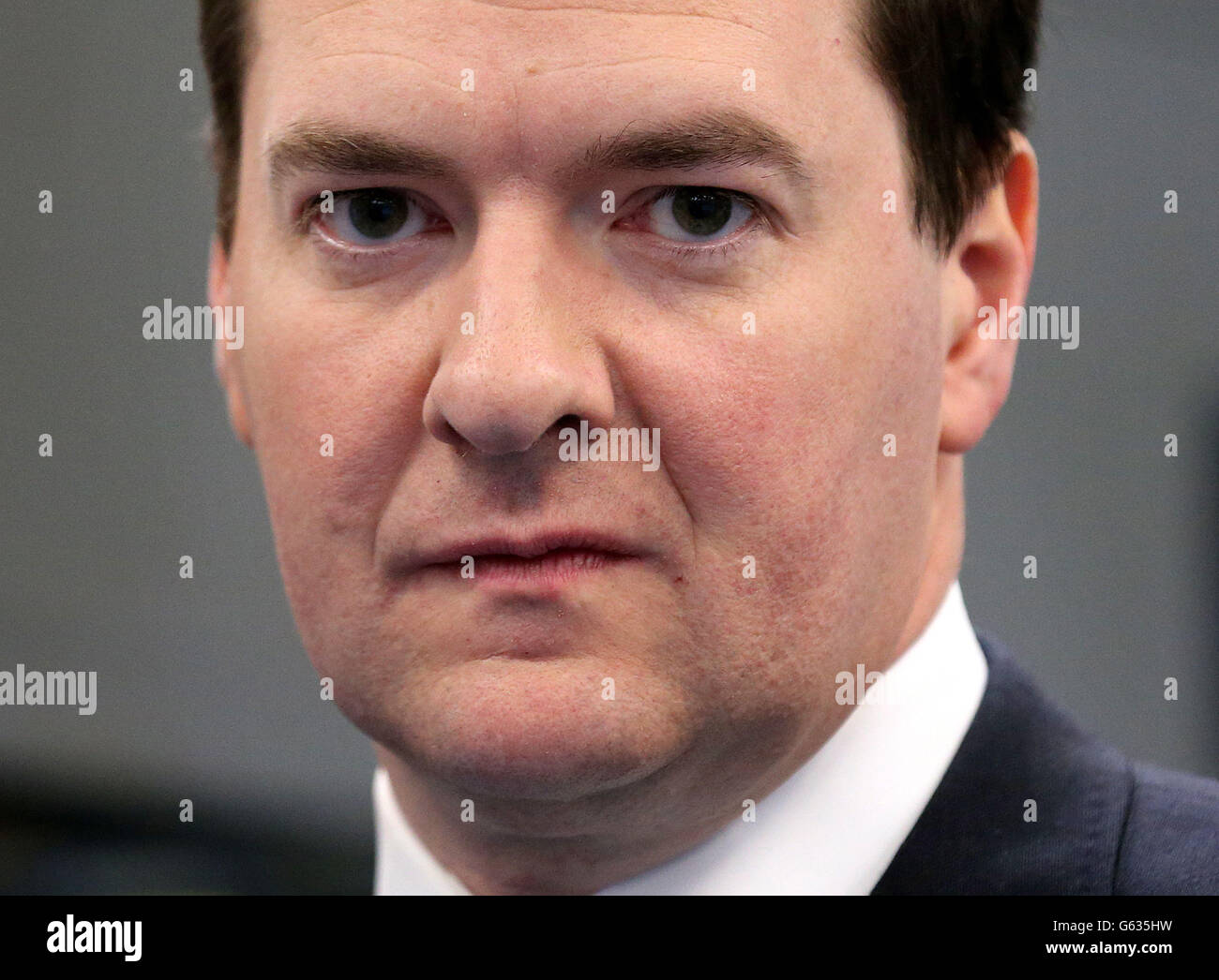 The Chancellor of the Exchequer George Osborne during a visit to the CNC milling section at Castle Precision Engineering in Glasgow after the launch of the Scotland Analysis paper on Currency and Monetary Policy in Glasgowl. Stock Photo