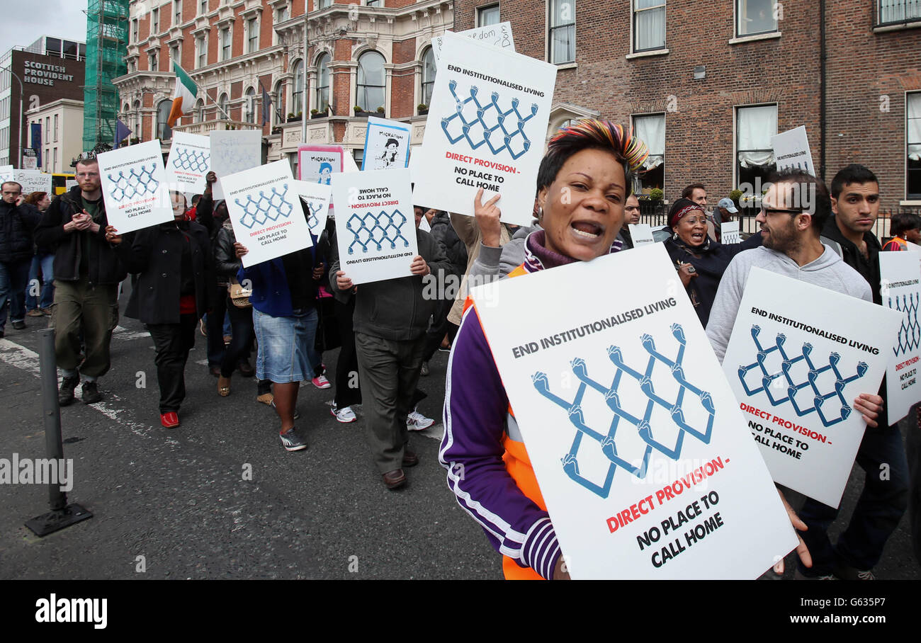 Asylum seekers, refugees, human rights supporters and members of the public march to the Department of Justice, in Dublin, to send a message to the Government demanding an end to the system of institutionalised accommodation for asylum seekers, known as Direct Provision. Stock Photo