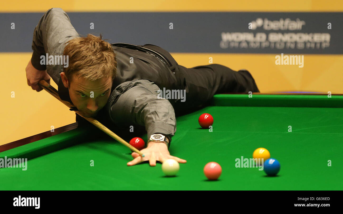 England's Ali Carter at the table in the first round against England's Ben Woollaston during the Betfair World Championships at the Crucible, Sheffield. Stock Photo