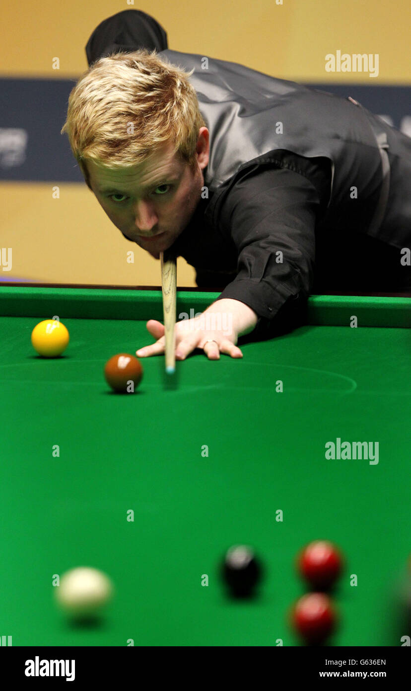 England's Ben Woollaston at the table in the first round against England's Ali Carter during the Betfair World Championships at the Crucible, Sheffield. Stock Photo