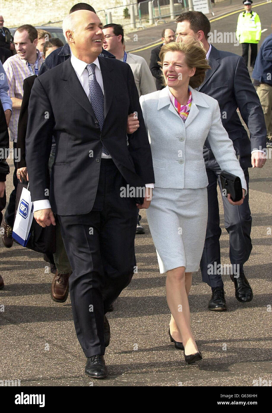 Leader of the Conservative Party Iain Duncan Smith walks with his wife Betsy from their hotel to the Conference Centre in Bournemouth. Stock Photo