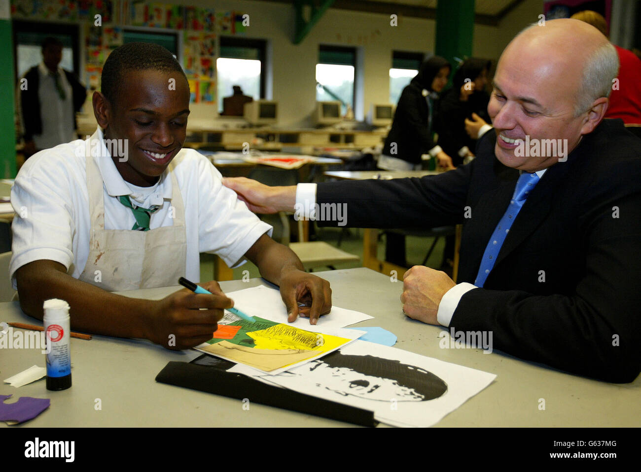Conservative Party leader, Iain Duncan Smith, meets pupils at Ducie HIgh school in Manchester, as he kicks off a national tour to underline his efforts to make reform of the public services the party's top priority. * The tour will take in a total of 17 locations in England, Wales and Scotland over the next three weeks. Stock Photo