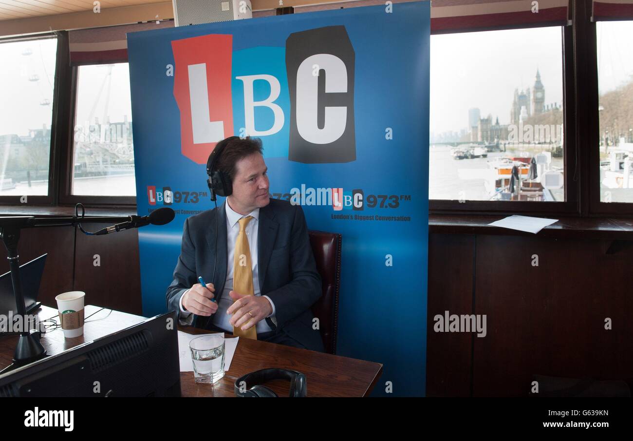 Deputy Prime Minister Nick Clegg co-hosts his weekly phone in radio show with LBC's Nick Ferrari (not pictured) on the moored boat the Tattersall Castle on the River Thames in London, where he was questioned by voters. Stock Photo