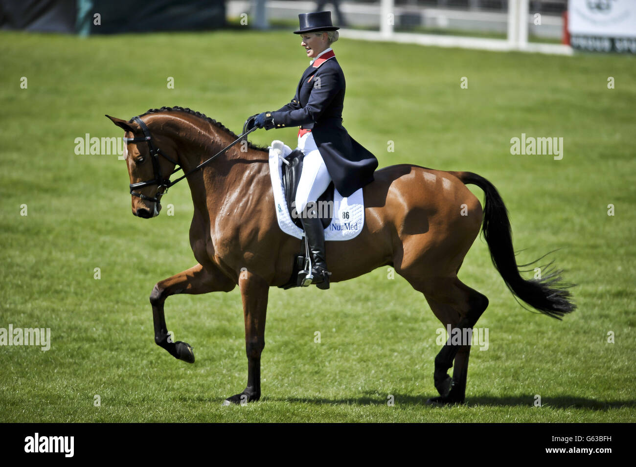 Zara Phillips on her horse High Kingdom as she enters the main arena for her entry in the dressage during day three of the Badminton Horse Trials in Badminton, Gloucestershire. Stock Photo