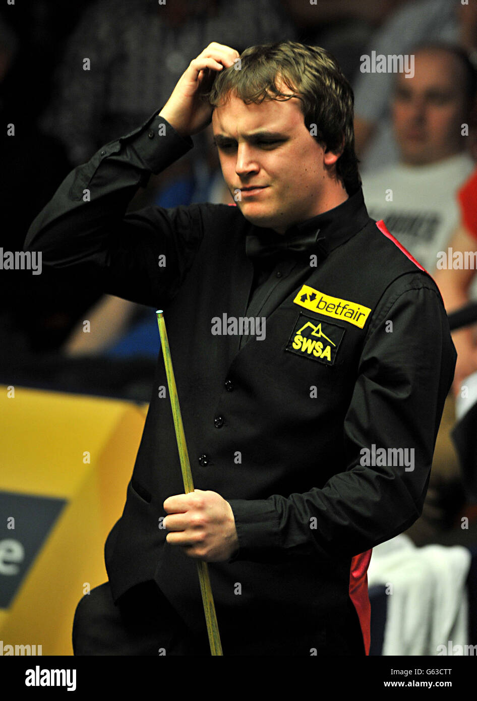 Sam Baird reacts during his first round match against Stuart Bingham during the Betfair World Championships at the Crucible, Sheffield. Stock Photo
