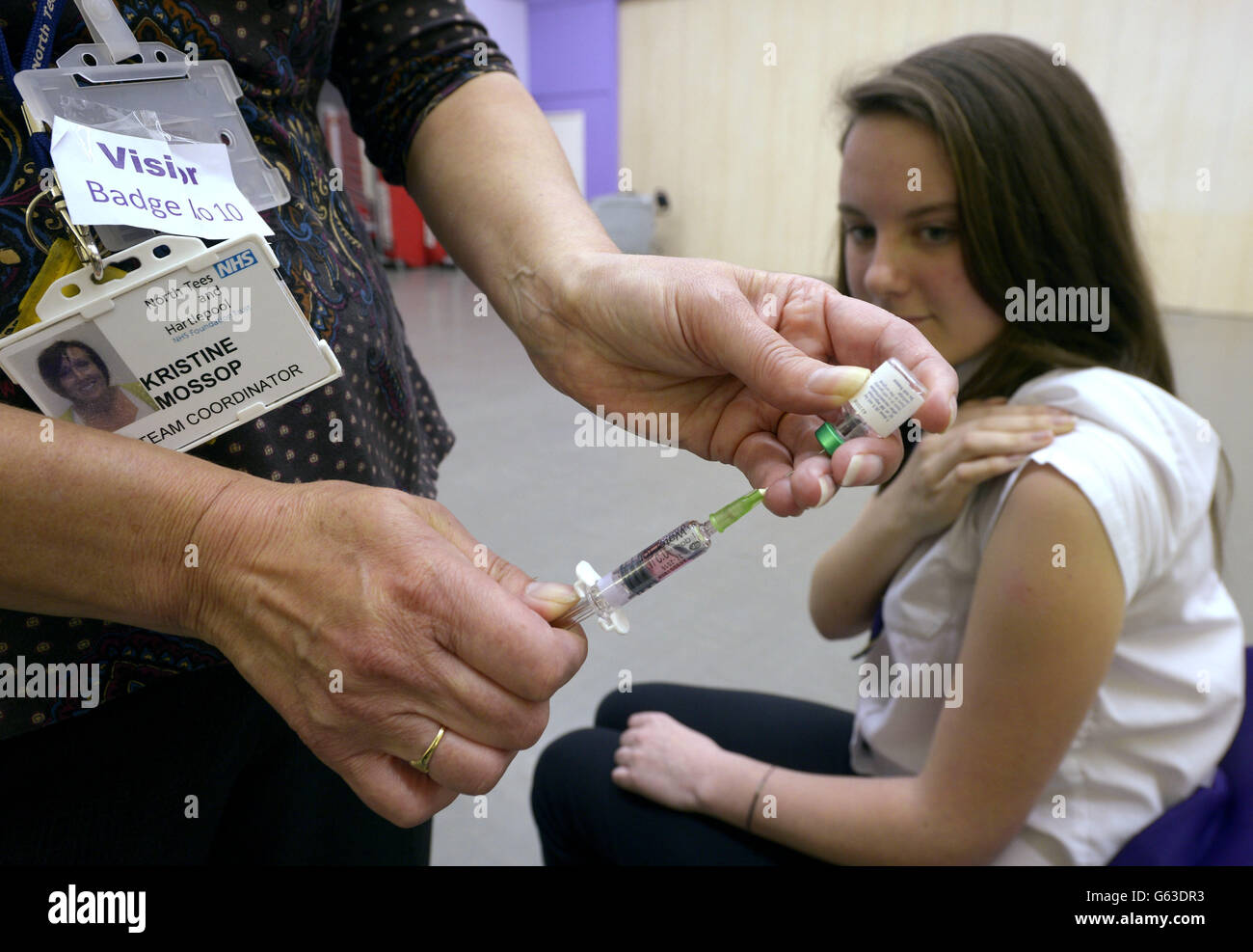 Lucy Butler,15, getting ready to have her measles jab at All Saints School in Ingleby Barwick, Teesside as a national vaccination catch-up campaign has been launched to curb a rise in measles cases in England. Stock Photo
