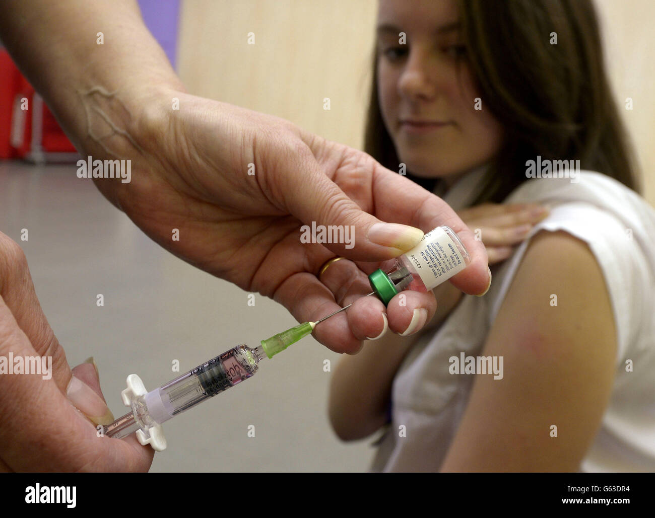 Lucy Butler,15, getting ready to have her measles jab at All Saints School in Ingleby Barwick, Teesside as a national vaccination catch-up campaign has been launched to curb a rise in measles cases in England. Stock Photo