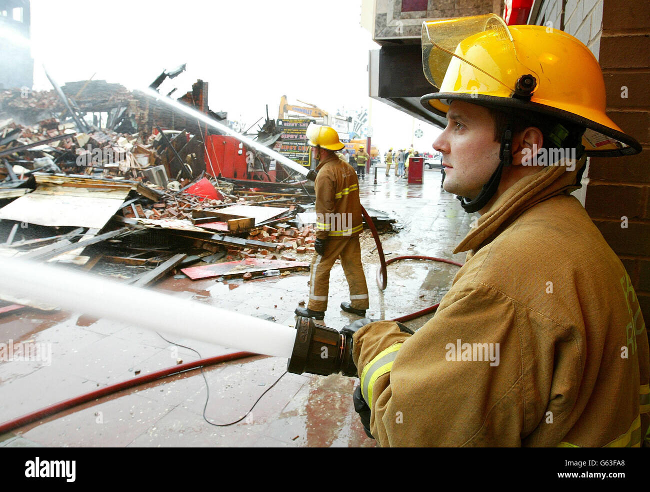 Firefighers in Blackpool bring a blaze at an amusements arcade under control. Thirty people were evacuated from their homes after firefighters forced their way into the the Grab City complex, which includes a Madame Tussaud's wax museum. * ... on Blackpool's south promenade after the blaze was discovered in the early hours of this morning. It was not yet known if the cause of the fire was suspicious police said. 26/10/02 : The Fire Brigades Union announced that strikes planned for next week have been suspended while fresh talks are held with employers. Stock Photo