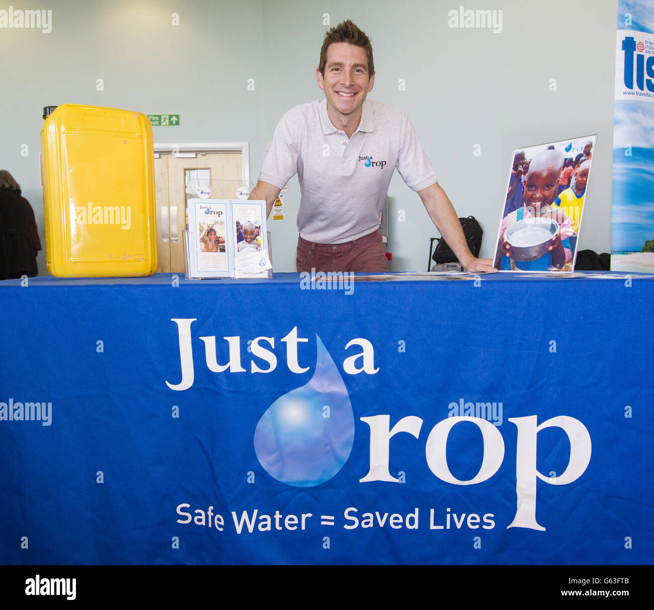 Chris Cook, Just a Drop charity School Ambassador and former Olympic swimmer at the City Cruise Terminal in Southampton before boarding Norwegian Cruise Line's new ship, the 146,600 tonne Norwegian Breakaway. Stock Photo