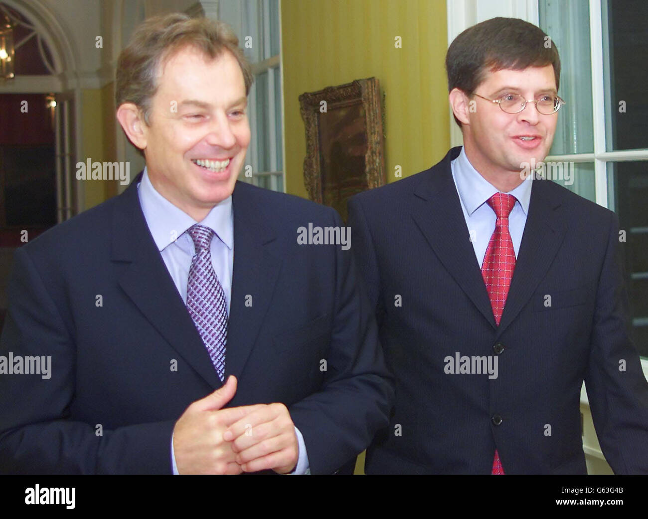 British Prime Minister Tony Blair (left) jokes with Dutch caretaker Prime Minister Jan Peter Balkenende at No.10 Downing Street. * Tony Blair called for agreement on a United Nations resolution over Iraq and underlined the seriousness of dealing with Saddam Hussein's weapons of mass destruction programme. Stock Photo