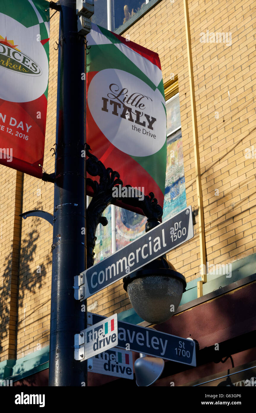 Little Italy banners and Commercial Drive street signs on a lamp post, Vancouver, British Columbia, Canada Stock Photo