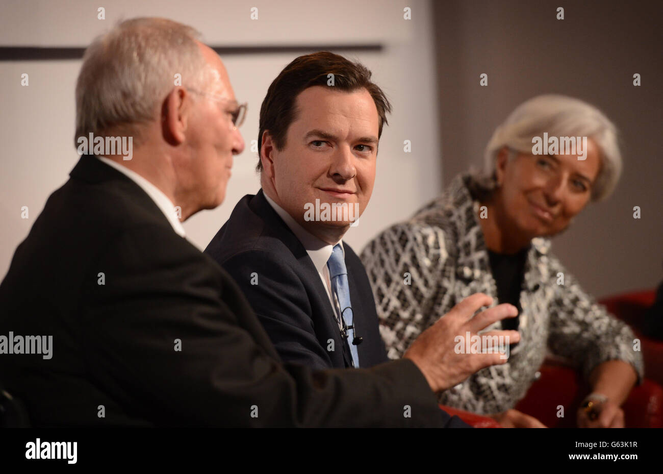 (Left - right) Dr Wolfgang Schauble, German Federal Minister of Finance, Chancellor of the Exchequer George Osborne, Christine Lagarde, Managing Director of the International Monetary Fund and Jim Flaherty, Minister of Finance, Canada hold a Q&A on the challenges facing the global economy at the the Global Investment Conference, London. Stock Photo