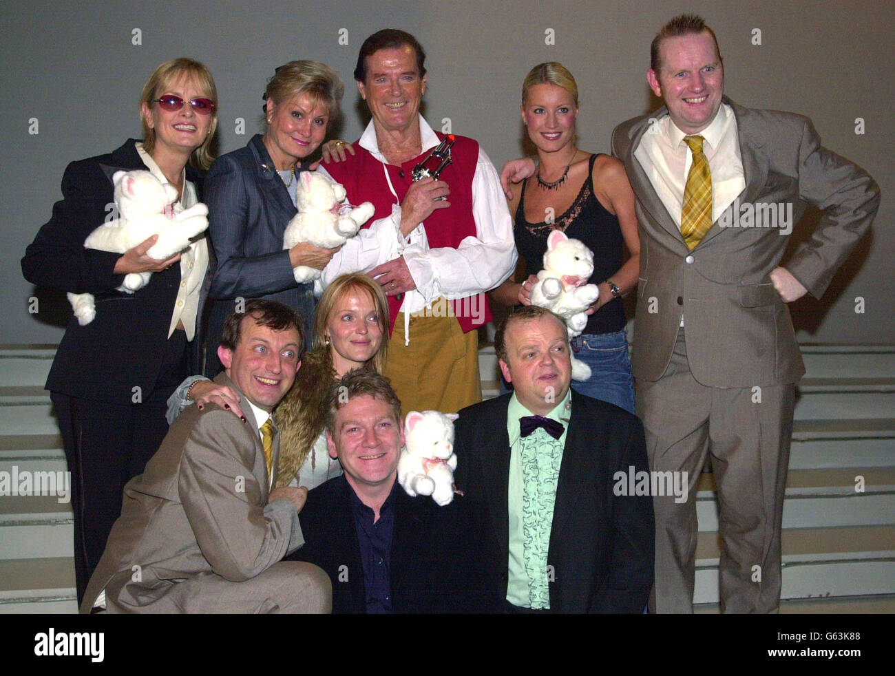 Back row; Twiggy, angela Rippon, Roger Moore, Denise Van Outen and Sean Foley. Front row; Hamish McColl, Miranda Richardson, Kenneth Branagh and Toby Jones on stage after the curtain came down during a charity performance of 'The Play What I Wrote' directed by Kenneth Branagh at the Wyndham Theatre in London's west end. Stock Photo