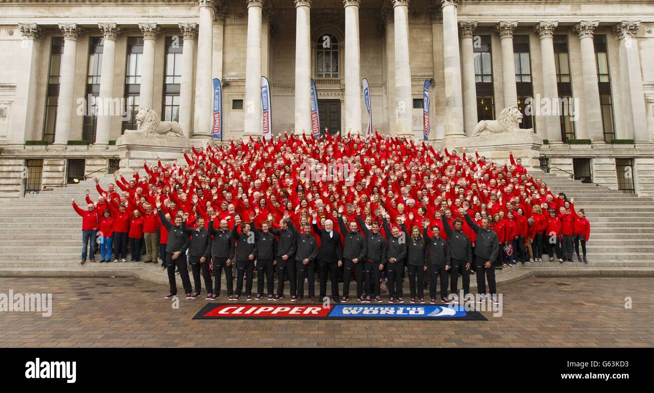400 men and women who make up the majority of the crew members of the Clipper 13-14 Round the World Yacht Race gather on the steps of the Guildhall in Portsmouth, Hampshire. Stock Photo