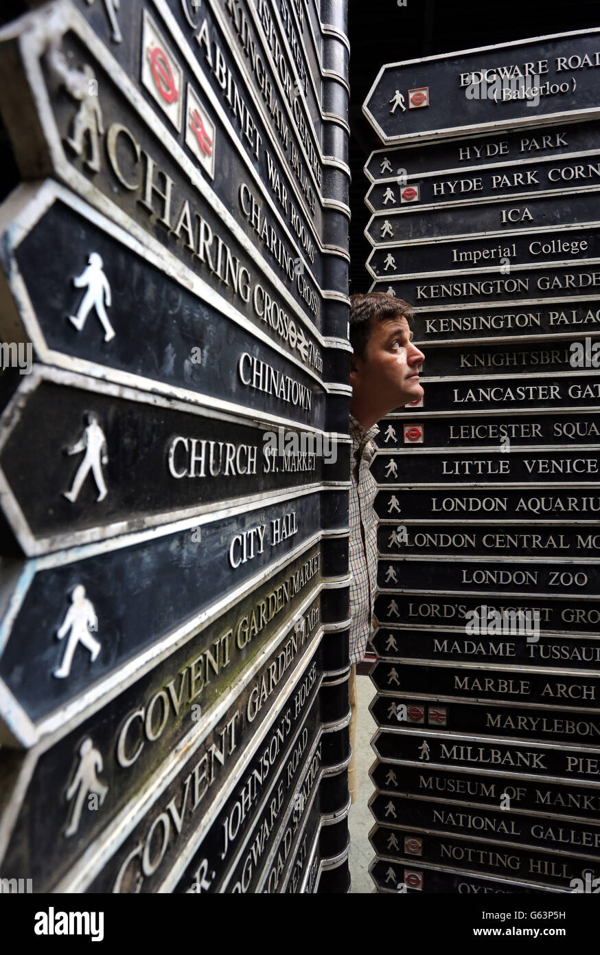 Rupert van der Werff of Summers Place Auctions in Billingshurst, West Sussex prepares over 300 historic London street signs for auction later this month. Picture date: Tuesday May 14, 2013. Photo credit should read: Gareth Fuller/PA Wire Stock Photo