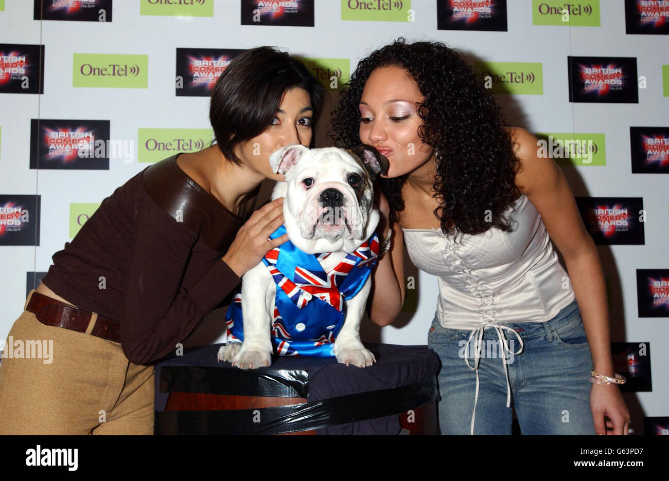 Marli Buck and Camilla Beeput from Fame Academy with a pedigree British bulldog Albert, at the launch party for The British Comedy Awards, at Sway in Covent Garden. Stock Photo