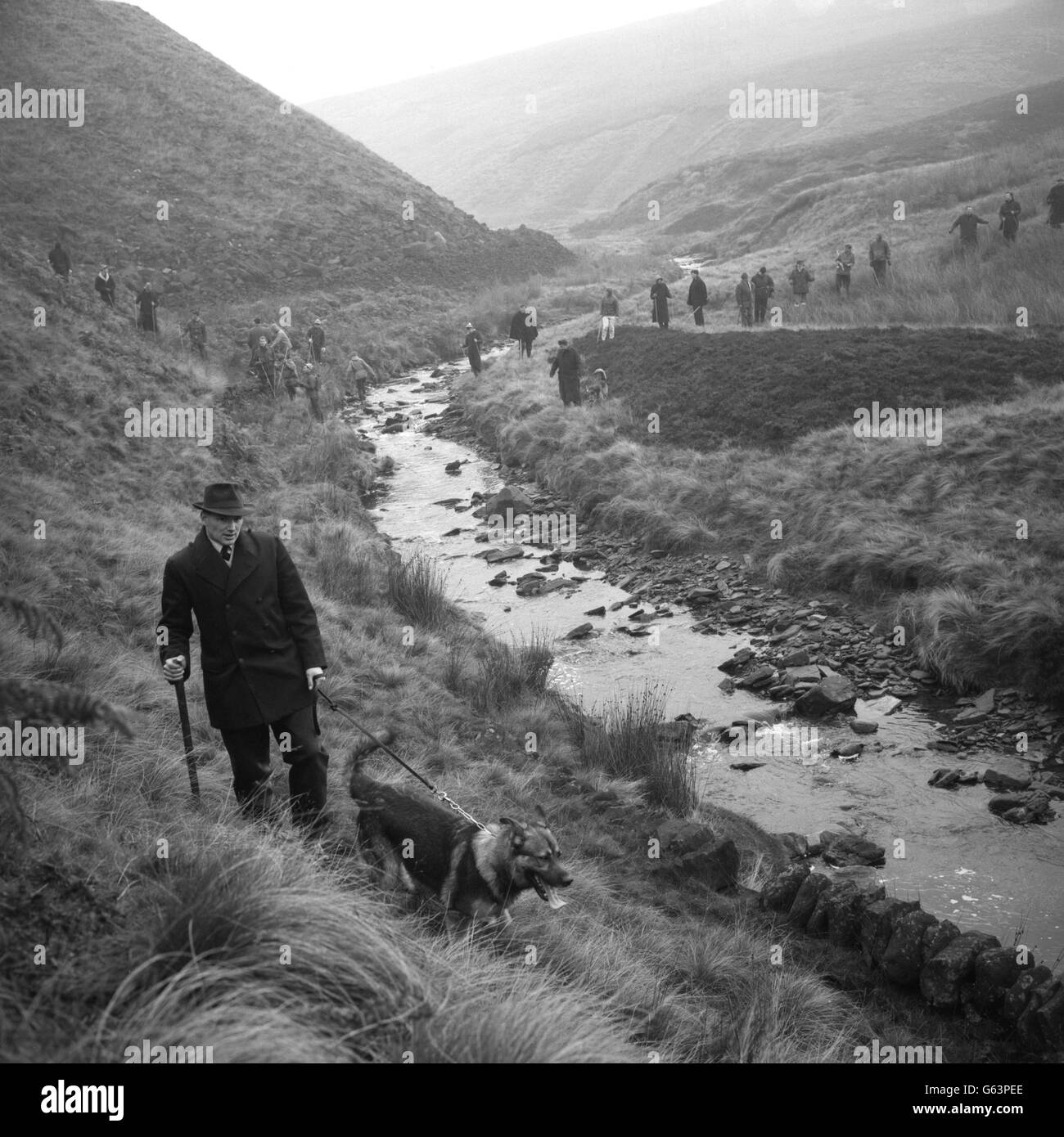 A police-mounted search of Saddleworth Moor, near Woodhead, for the bodies of the victims of the Moors Murderers. Stock Photo