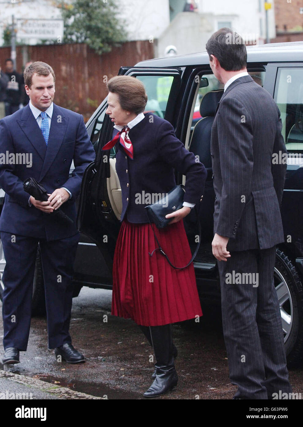 The Princess Royal and her husband, Commander Tim Laurence (right), arrive with her children, Peter (left) and Zara (hidden) Phillips, at East Berkshire Magistrates Court in Slough to face allegations that her dog bit two children in Windsor Great Park. The couple have been summonsed under Section 3 (1) of the Dangerous Dogs Act 1991 and are alleged to have been in charge of a dog that was dangerously out of control in a public place and injured the children. The Princess would become the first royal to have a criminal record if convicted of the charges. Stock Photo