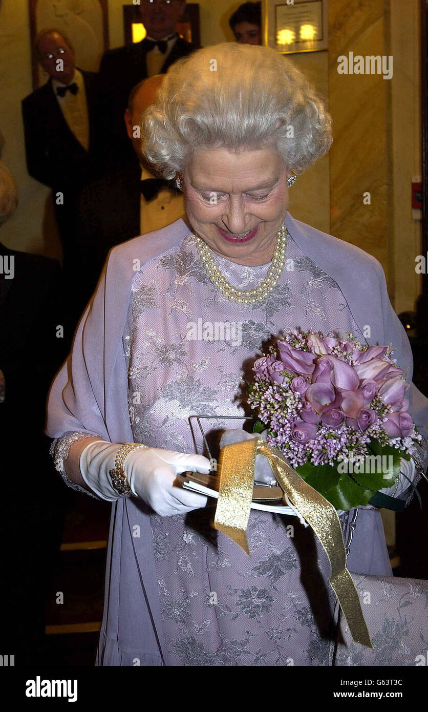Britain's Queen Elizabeth II attends the 50th anniversary of the world's longest-running play, The Mousetrap, at St Martin's Theatre, London. *..Agatha Christie's famous whodunit, the first stage production to achieve a golden jubilee, opened on November 25, 1952, 10 months after the Queen came to the throne. Stock Photo