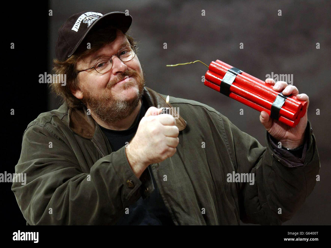 American film and documentary maker and author Michael Moore at the Roundhouse Theatre in London, for a photocall to promote his new show 'Michael Moore Live!' * Which is described as a platform for the expression of revolting opinions about America's polictical and legislative systems. Stock Photo