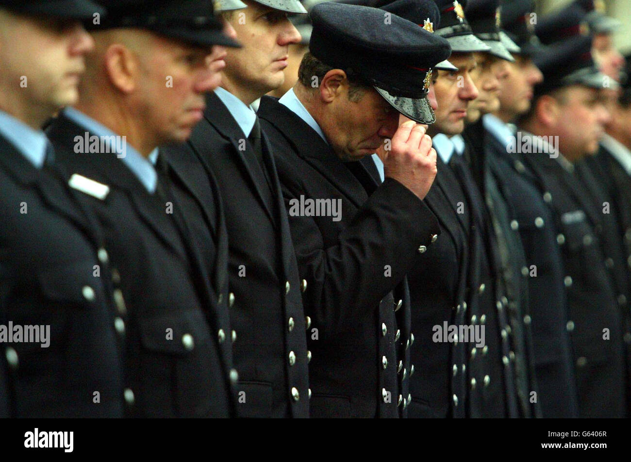 Friends and collegues at the funeral service of Leicestershire fireman Robert Miller, at Leicester Cathedral, paying their final respects. * Father-of-two Bob Miller, 44, died October 31 after falling through a floor while searching for occupants in derelict premises in Morledge Street, Leicester. Stock Photo