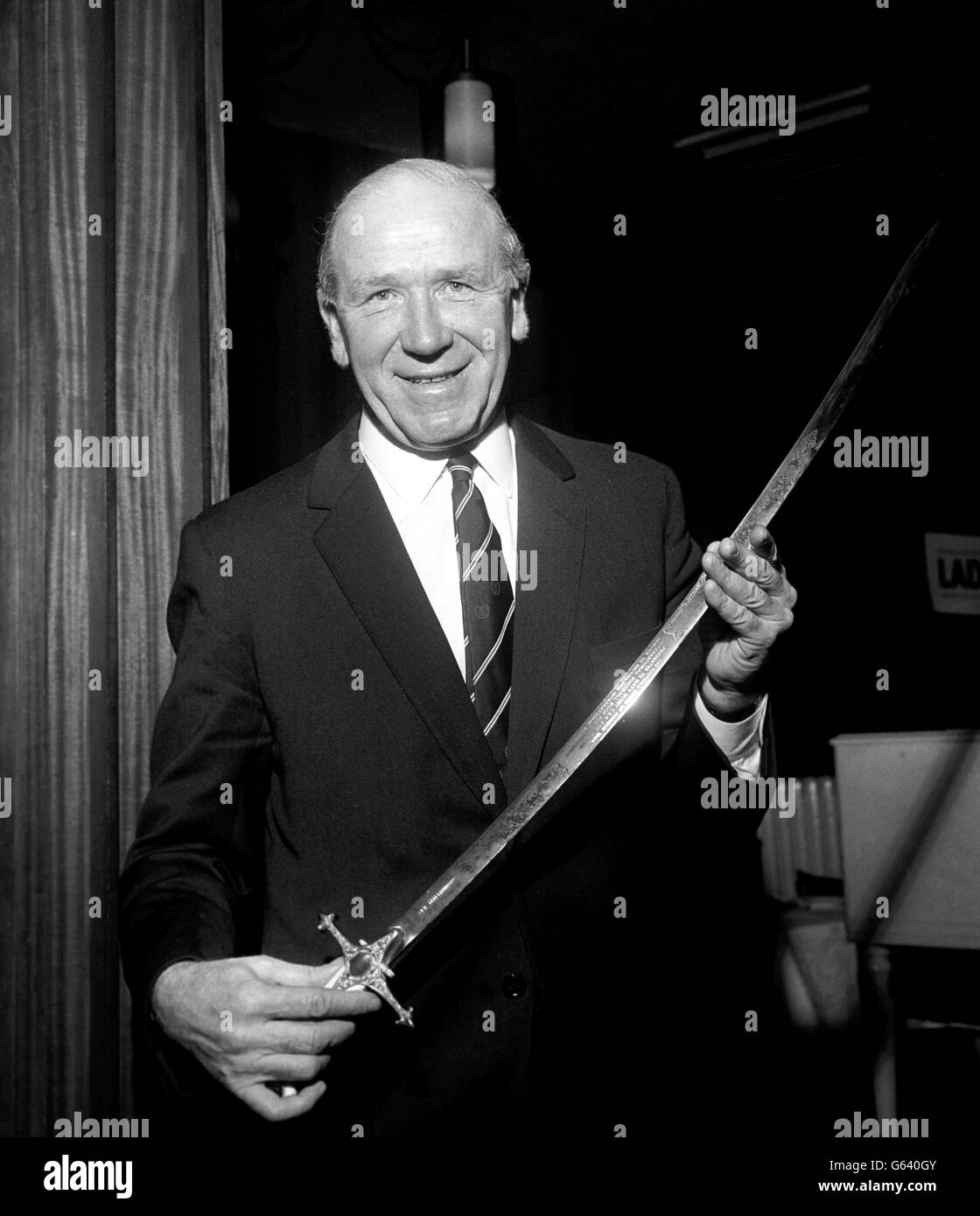 Matt Busby with the Football Sword of Honour Stock Photo