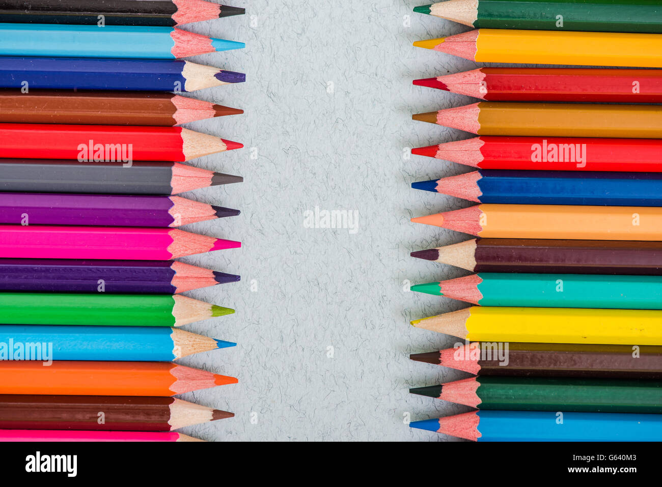pencils spectrum on drawing papper overhead with copy space Stock