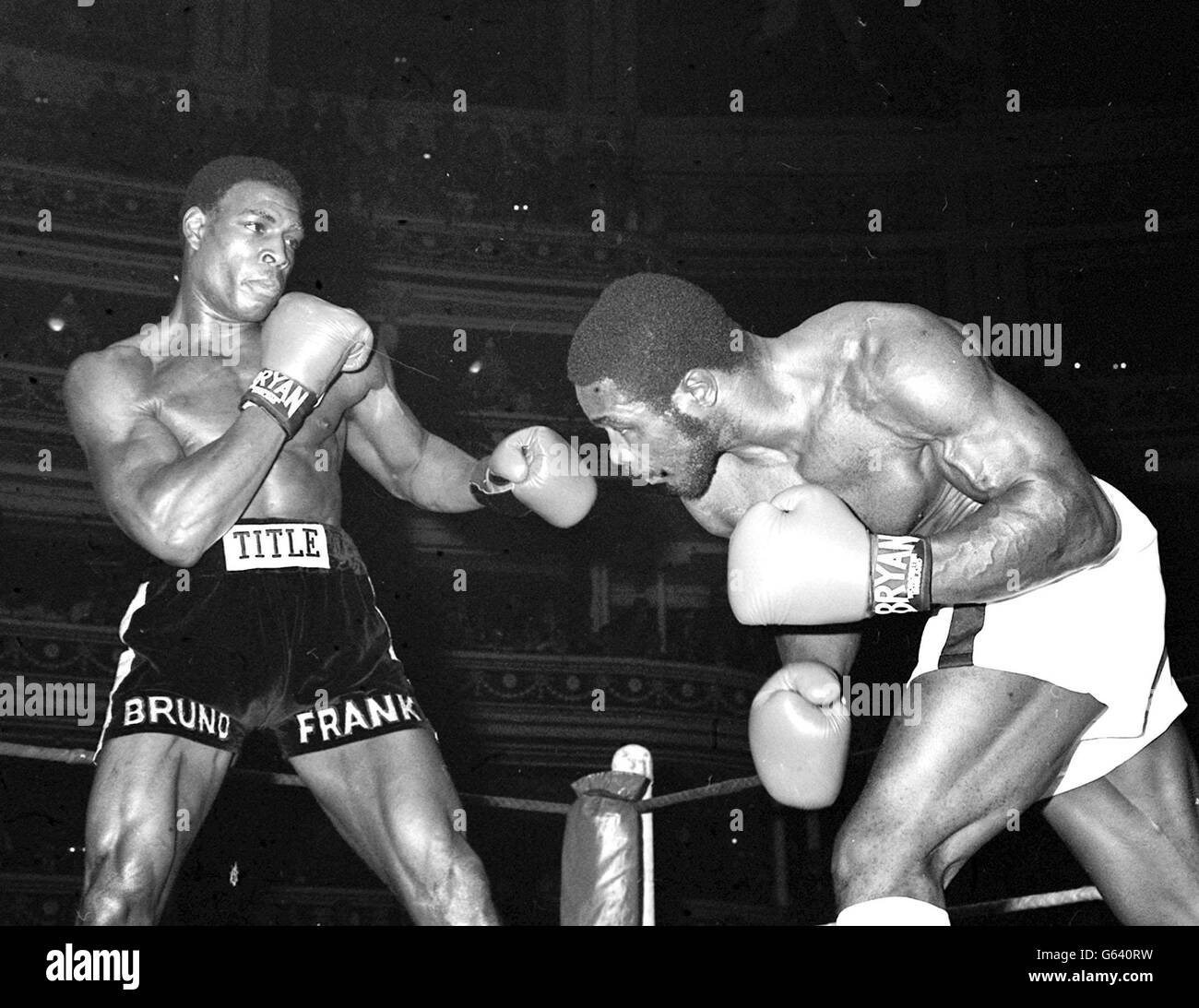 Britain's unbeaten heavyweight Frank Bruno (left) -- 19 wins inside the distance, attacks opponent Floyd 'Jumbo' Cummings of America during tonight's 10-round contest at the Royal Albert Hall, London which the London man won in the 7th round. Stock Photo
