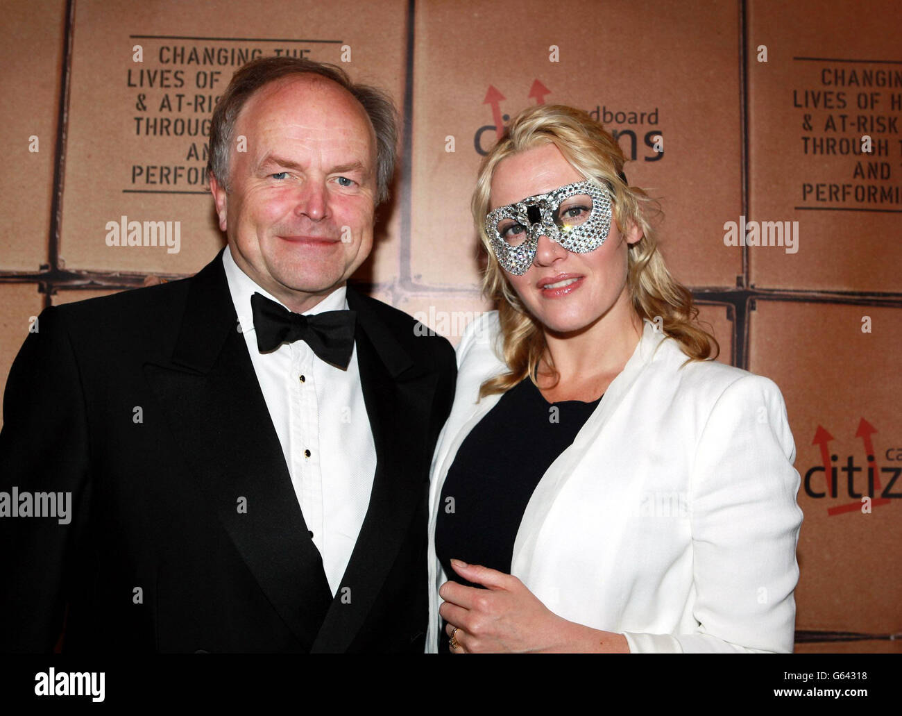 Actress Kate Winslet and Clive Anderson (left) co-host a fund raising dinner as patron of the charity Cardboard Citizens at the Drapers Hall in the City of London. Stock Photo