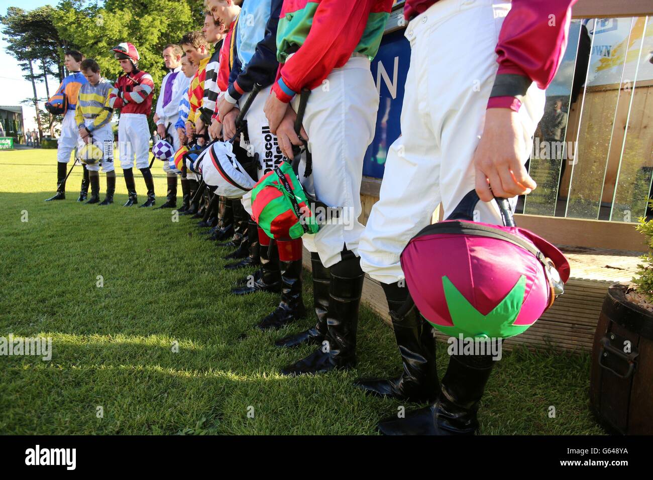 Jockey's hold a minutes silence in memory of the late Sir Henry Cecil