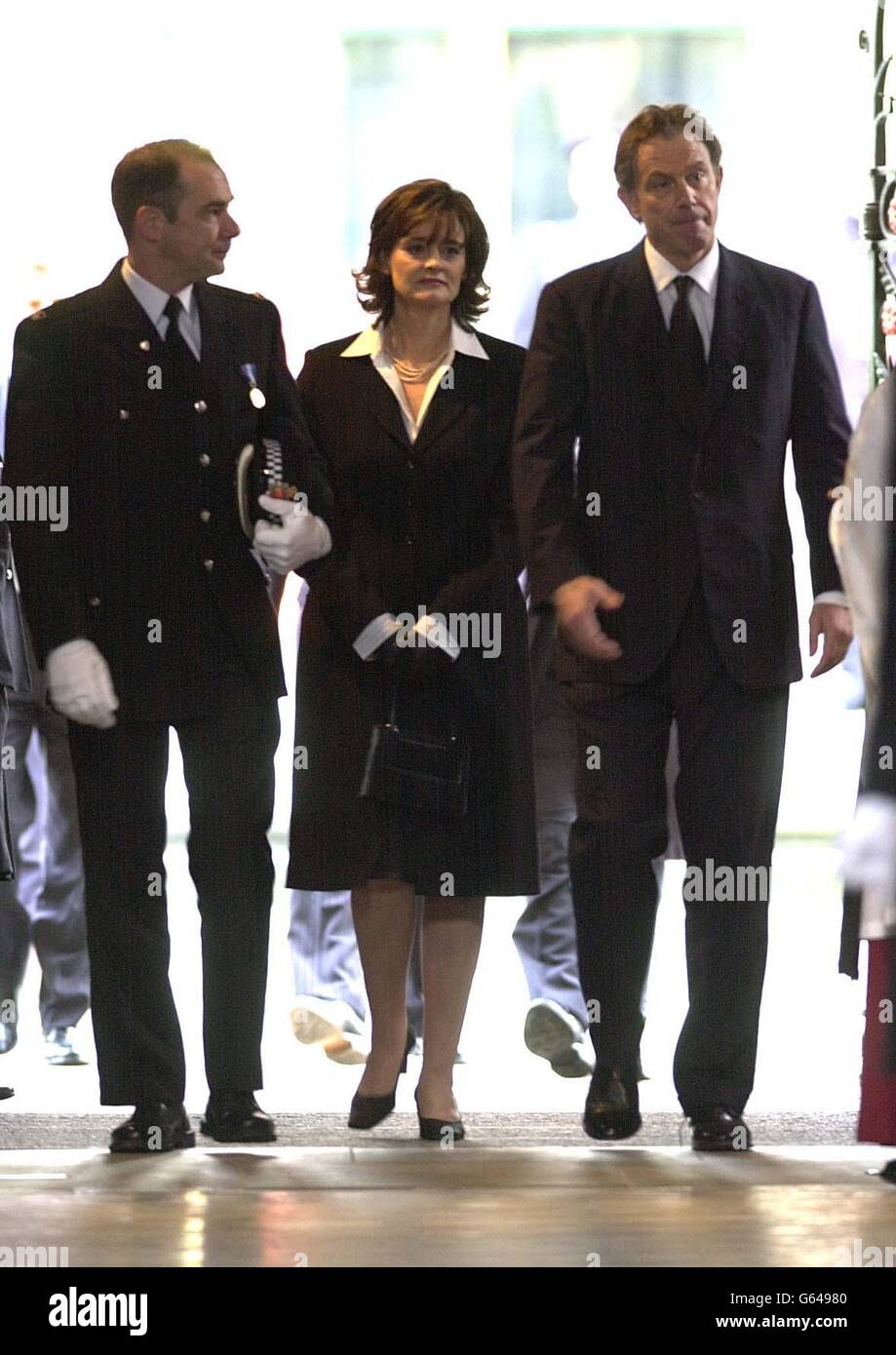 Prime Minister Tony Blair and wife Cherie arrive for the funeral of Detective Constable Stephen Oake at Manchester Cathedral. A thousand mourners attended the funeral of the Special Branch police officer. *... stabbed to death in an anti-terrorism raid in Manchester. Stock Photo