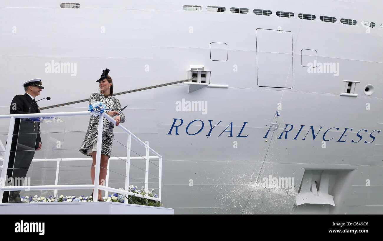 Captain Tony Draper and the Duchess of Cambridge watch the bottle of ...