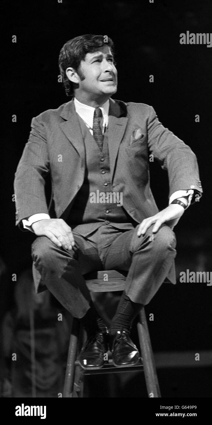 Dave Allen. Comedian Dave Allen performs on stage Stock Photo Alamy