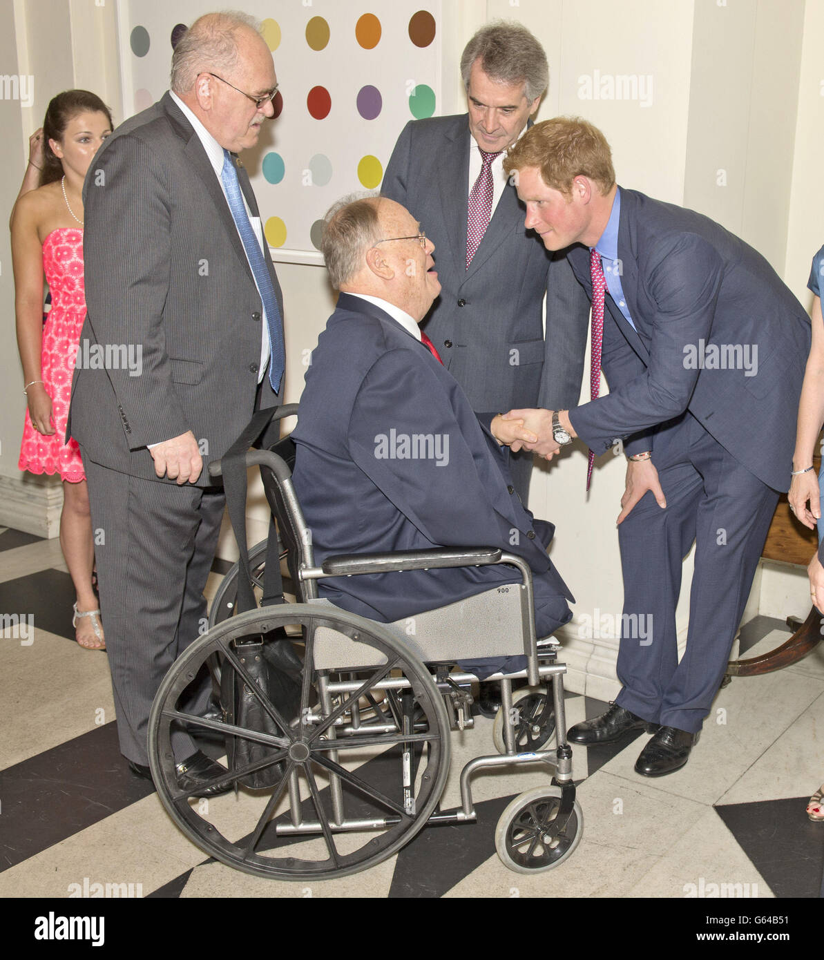 Prince Harry meets former Senator Max Cleland while greeting attendees before a reception and dinner at the British Ambassador's residence in Washington DC, on the first day of his seven-day visit to the United States. Stock Photo