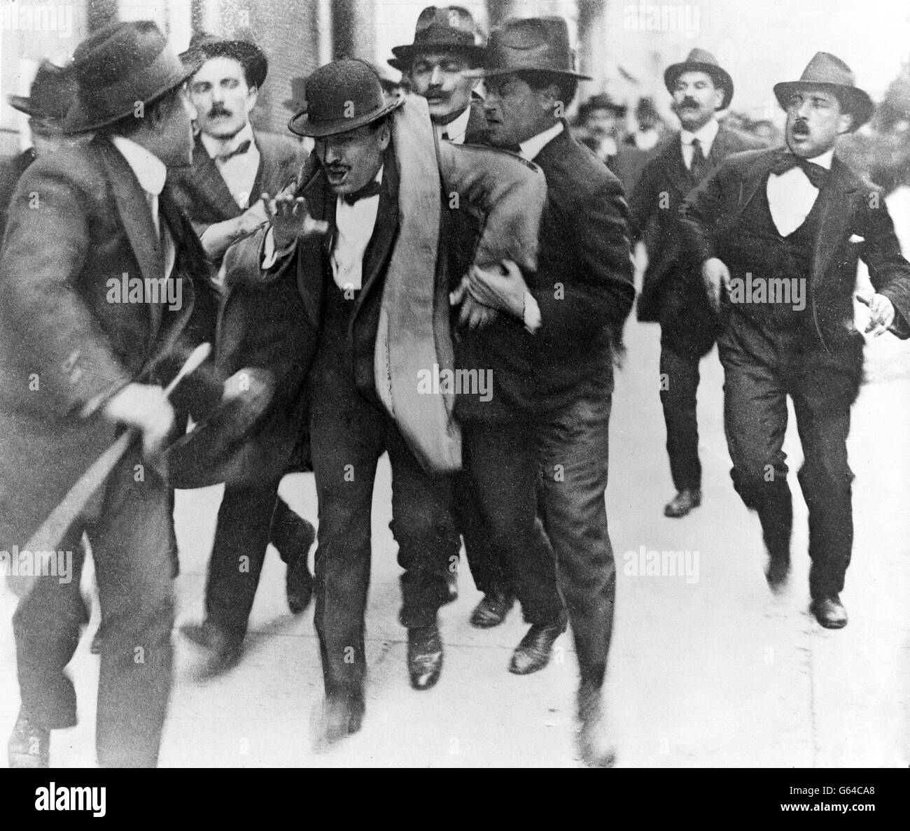 Fasci d'Azione Rivoluzionaria members Benito Mussolini being arrested. Stock Photo