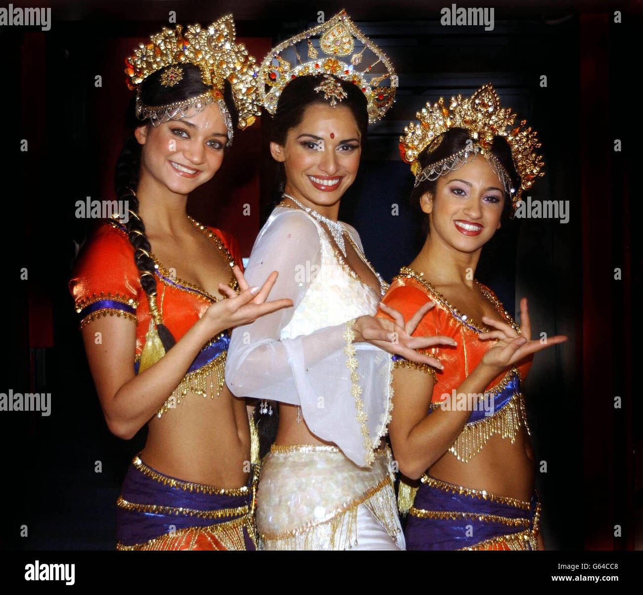 Members of Bombay Dreams cast, from left to right; Angela, Ayesha Dharker and Kella during a photocall at the Indian pavillion to help promote Indian tourism, part of the World Travel Market at London's EXCEL exhibition centre in the Docklands. Stock Photo