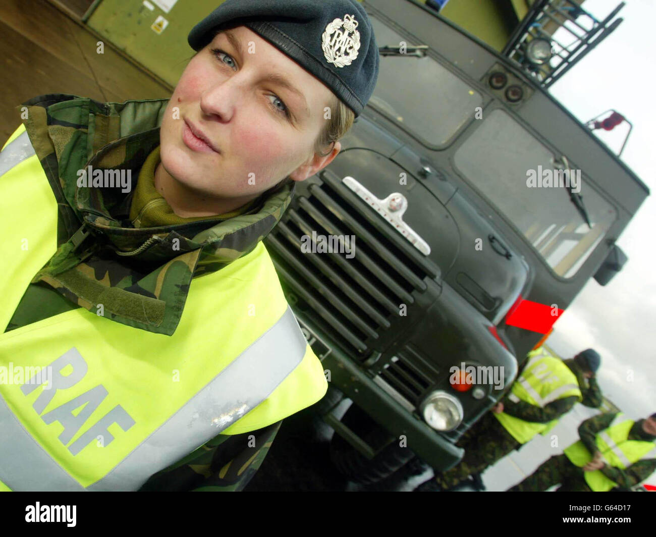 Corporal Kate Lunn, 21, of Grosport, Hampshire, a PT Instructor at RAF Henlow, Bedfordshire, is a Green Goddess Commander from the Cambridgeshire RAF fire team manning the pumps for the fire strike. Stock Photo