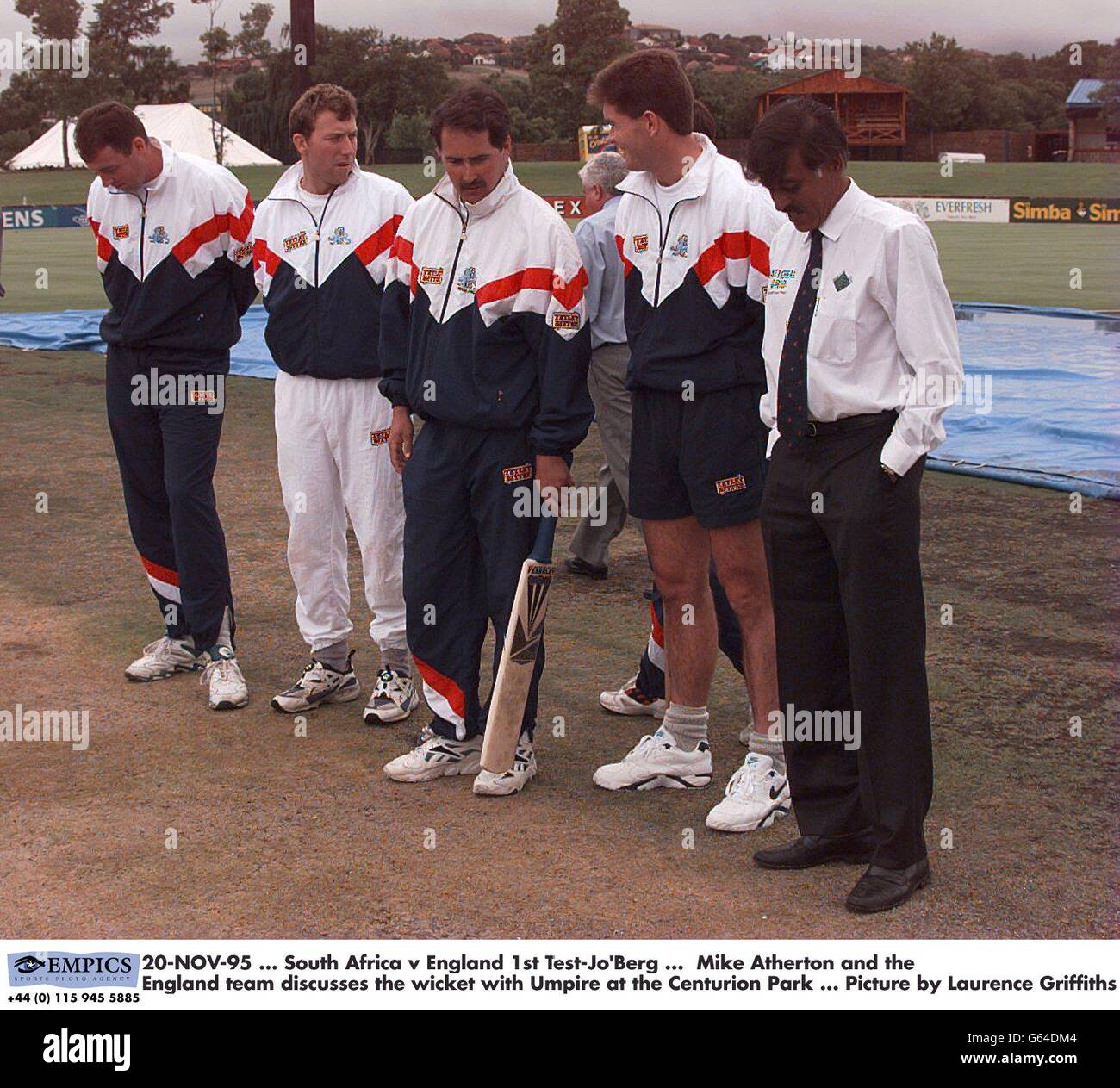 20-NOV-95. South Africa v England 1st Test-Jo'Berg. Mike Atherton and the England team discusses the wicket with Umpire at the Centurion Park. Picture by Laurence Griffiths Stock Photo