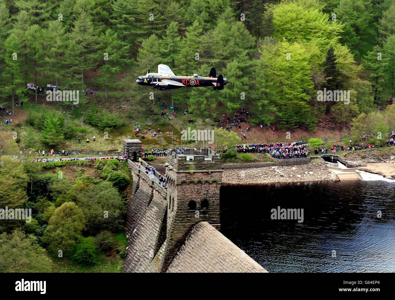 A Lancaster bomber during the Battle of Britain Memorial Flight performs a flypast over the Derwent Reservoir as part of a series of events to commemorate 70th anniversary of the Dambusters raid. Stock Photo