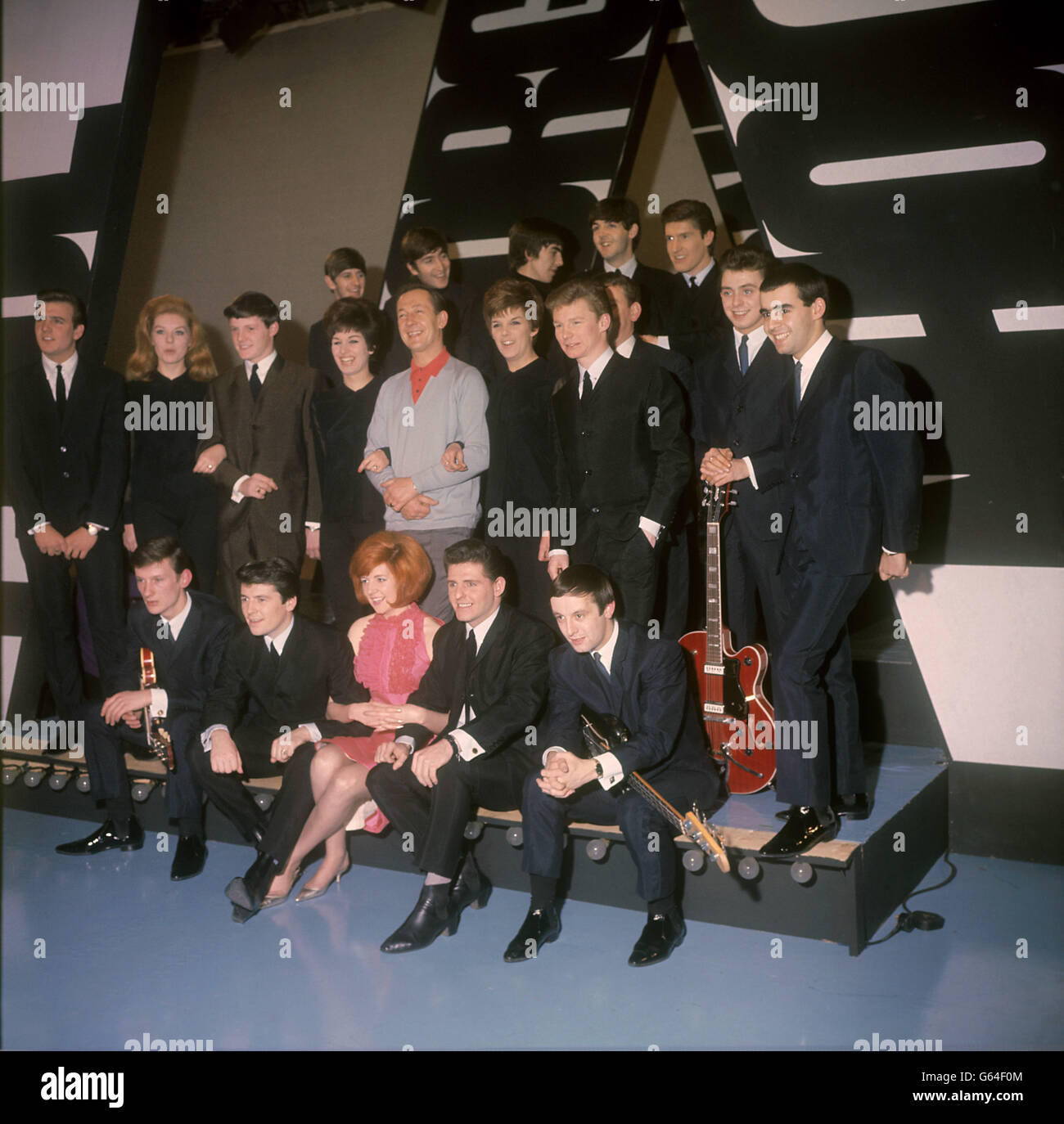 Rehearsals at Alpha studios, Birmingham, for ABC's 'Thank Your Lucky Stars' programme with Brian Matthew, (c, blue sweater), Cilla Black (pink dress), The Beatles (back), Billy J. Kramer and the Dakotas, Gerry and the Pacemakers and The Searchers. Stock Photo