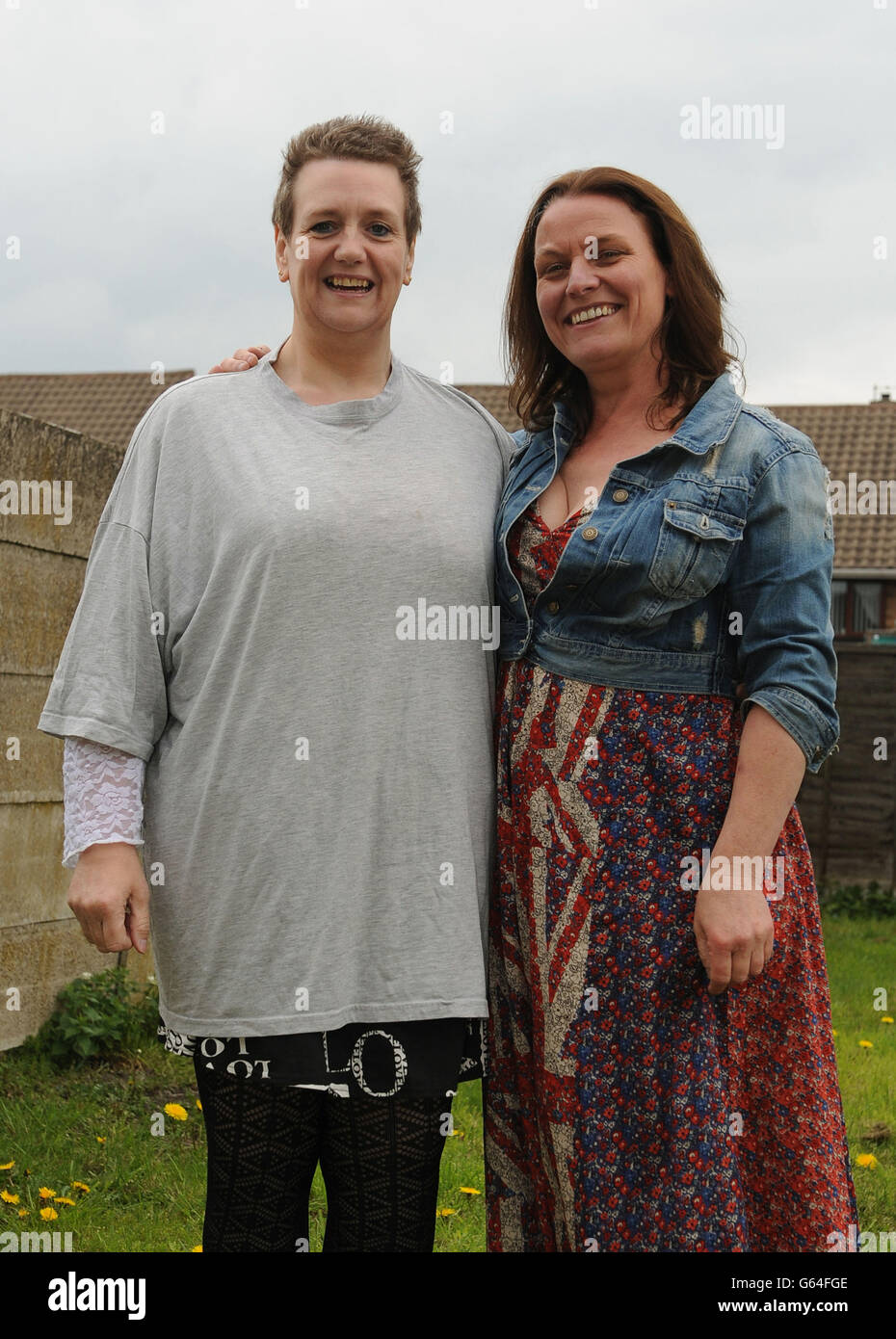 Denise Petty, 42, from Walsall (left) with her Weight Watchers leader Bev Longsden, 43, after losing an incredible 21 stone after being referred to Weight Watchers by her doctor. Stock Photo